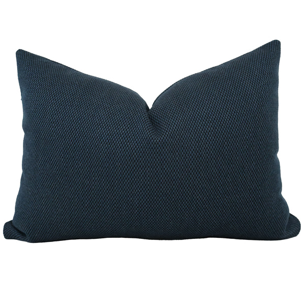 Hackner Home Midnight Harbor lumbar pillow cover in deep navy with a textured woven fabric and soft, tailored shape.