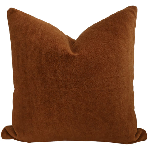 Front view of a rust-colored mohair pillow cover showing its soft, plush texture and rich, warm tone.