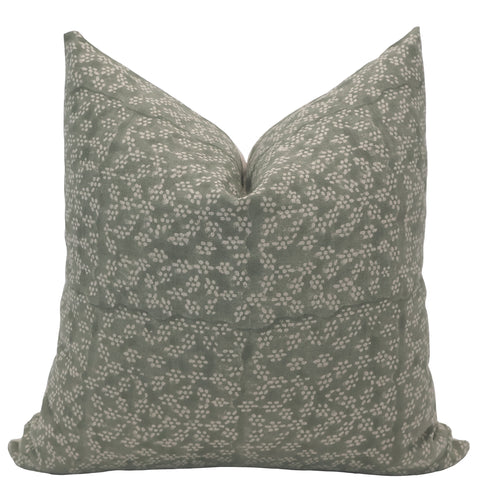Hackner Home Sage Green Floral Block Print pillow cover featuring an ivory botanical pattern on soft green fabric.