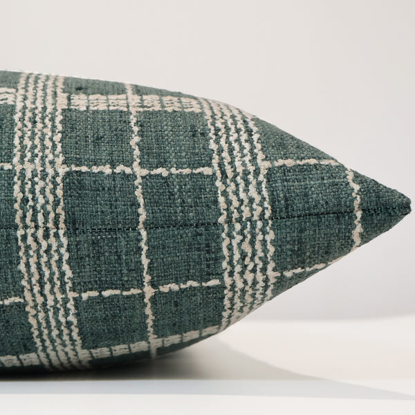 Side view of the Hackner Home Vine Vale pillow cover showing the green and ivory plaid texture and detailed woven pattern.