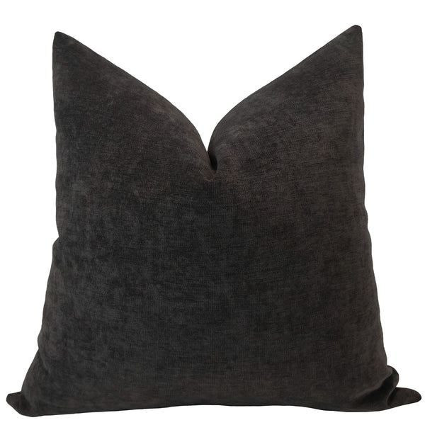 Front view of a dark slate gray velvet pillow cover featuring a smooth, plush texture and elegant tailored shape.