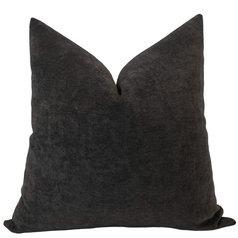 Front view of a dark slate gray velvet pillow cover featuring a smooth, plush texture and elegant tailored shape.