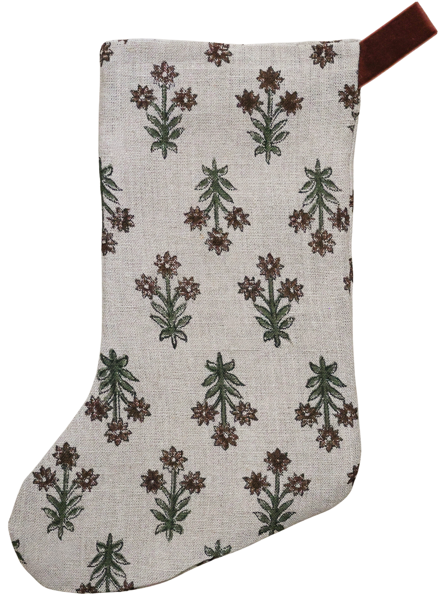 Hackner Home Wood Lily Block Print Christmas Stocking featuring a hand-printed floral design in earthy green and brown tones on a natural linen fabric, accented with a brown velvet hanging loop for a warm, boho-inspired holiday look.