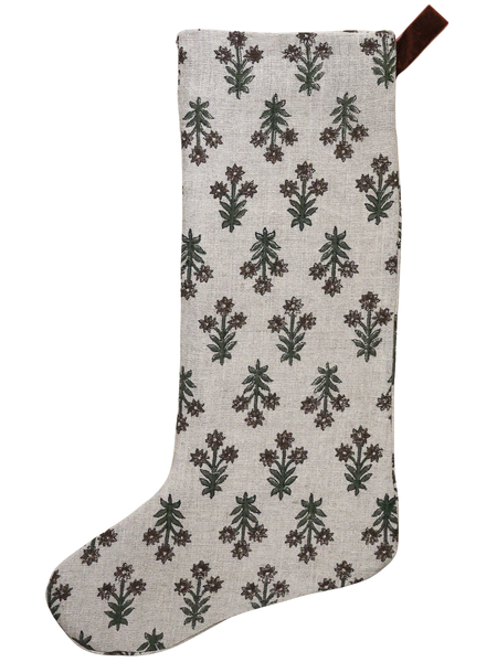 Hackner Home Wood Lily Block Print Large Minimal Christmas Stocking featuring a hand-printed floral pattern in earthy green and brown tones on a natural linen background with a velvet hanging loop.