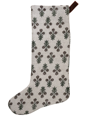 Hackner Home Wood Lily Block Print Large Minimal Christmas Stocking featuring a hand-printed floral pattern in earthy green and brown tones on a natural linen background with a velvet hanging loop.