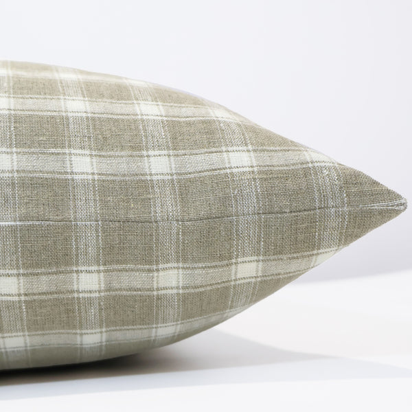 Side view of beige and white woven linen plaid pillow cover — handcrafted lumbar cushion by Hackner Home.